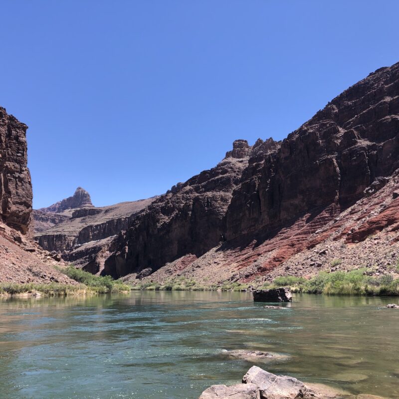 home backpacking trips the desert hiking company Grand Canyon New Hance Ancient Trail Red Canyon Colorado River Four Day backpacking trip with the desert hiking company. the papago slide in in the distance with seventy five mile canyon. the Colorado is ice cold and we swim in the river on trip during the summer time. the red canyon adventure with the desert hiking company is an incredible opportunity to connect and reflect on life and nature.